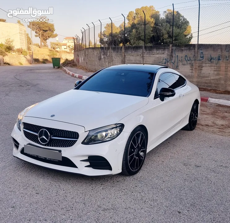 مرسيدس C300 2020/ فل مسكر بانوراما عداد ديجتال فرش عسلي / ولا جرام بويا / بالكررراتين وكالة