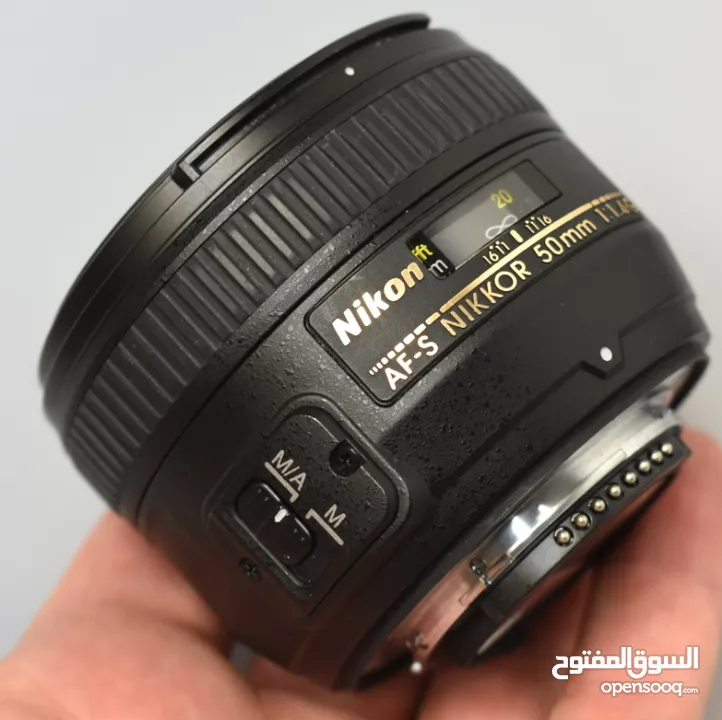 كاميرا Nikon D90 مع عدسة + ترايبود + اكسسوارات