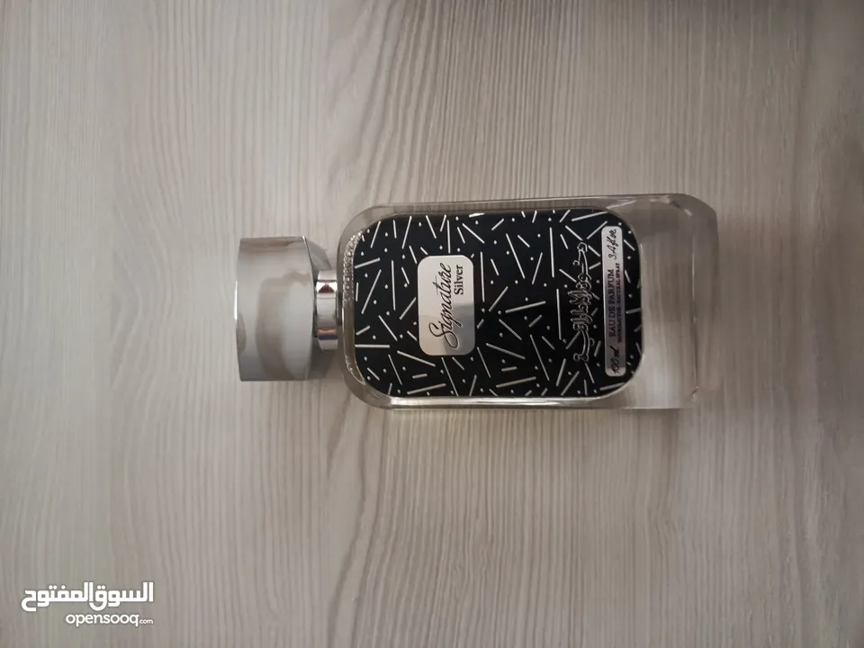 عطر رجالي دخون الإماراتية 100مل ( signatuse silver ) أصلي
