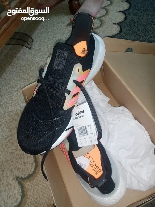 حذاء adidas UltraBoost 22 Black Flash Orange اصلي بنص سعره بسعر مغري جدا الفضل للمشي والراحة