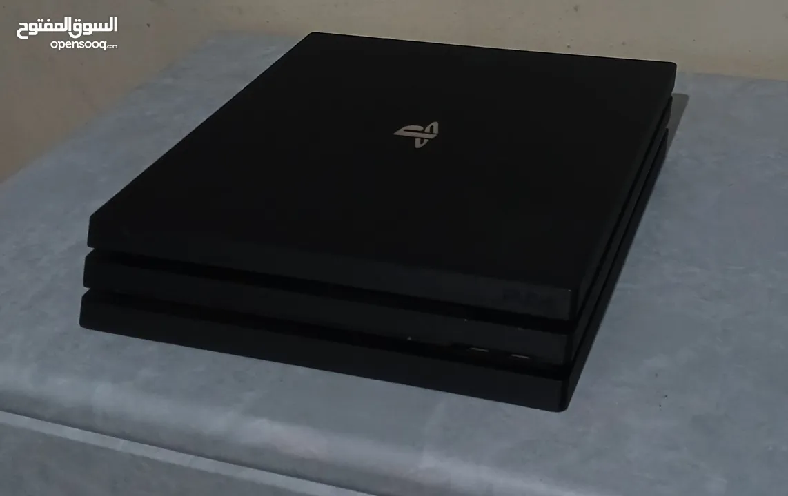 PS4 PROبلايستيشن فور برو مع يد اصلية