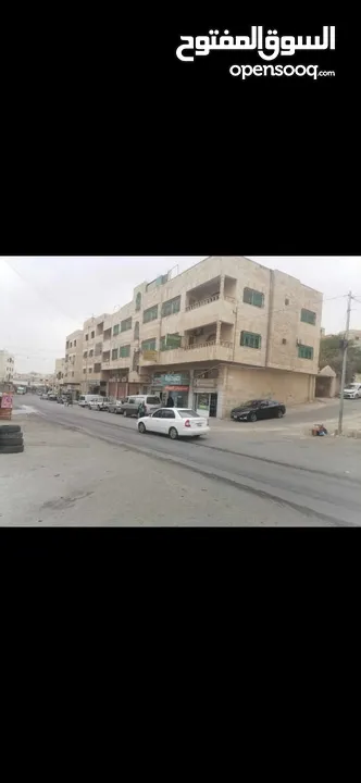 عمارة في حي القادسية للبيع موقع ممتاز وحيوي