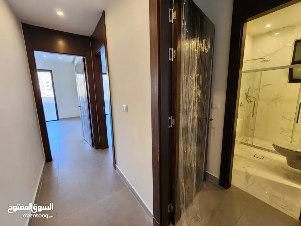 شقة طابقية فاخرة للبيع في عبدون  ref : 14383