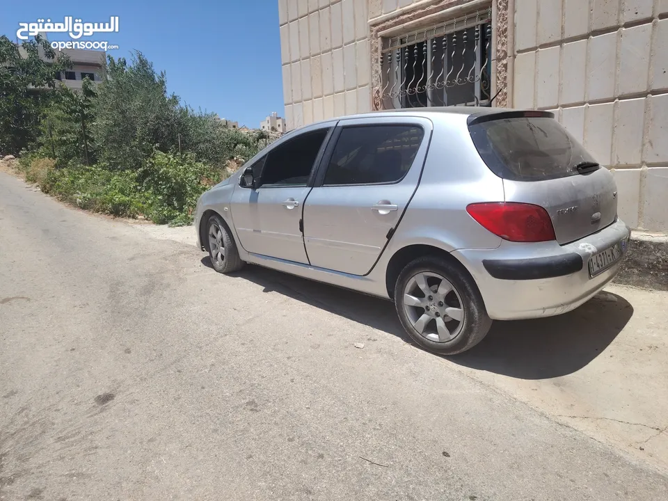 سياره بيجو 307 بحاله جيده جدآ متور 2000 cc بنزين اتوماتيك موديل 2007