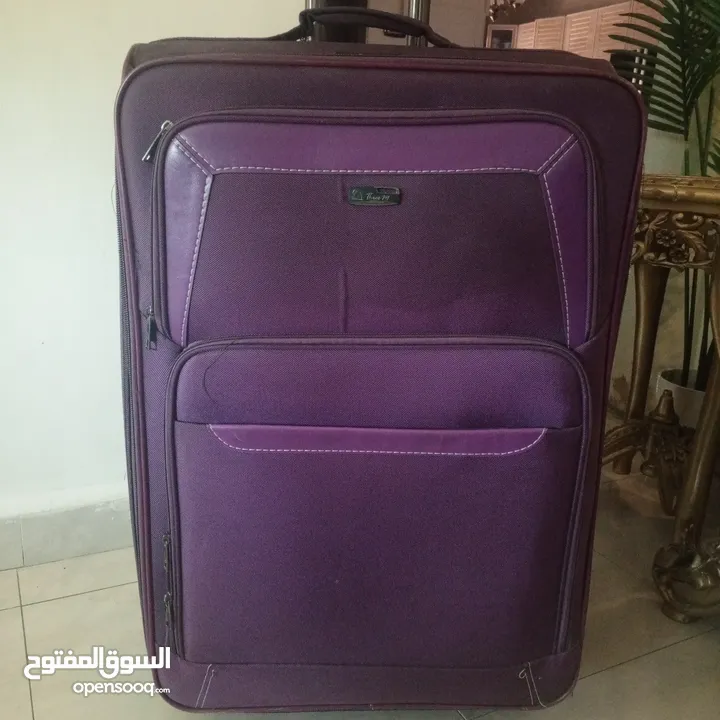 شنتة سفر جر لون بنفسجي غامق حجم كبير