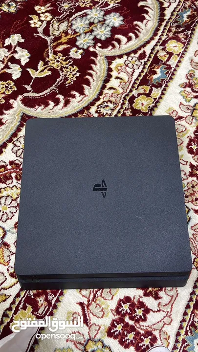 PS4 slim 500gb + 2 controllers + video games