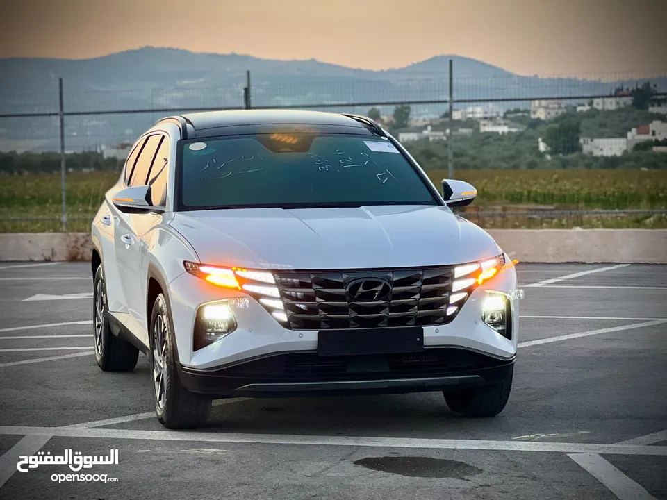 هونداي توسان 2023/ فل الفل فتحة سقف بانوراما  2x4 ///240Hp بنزين + كهرباء  ( Haybrid) 1600cc