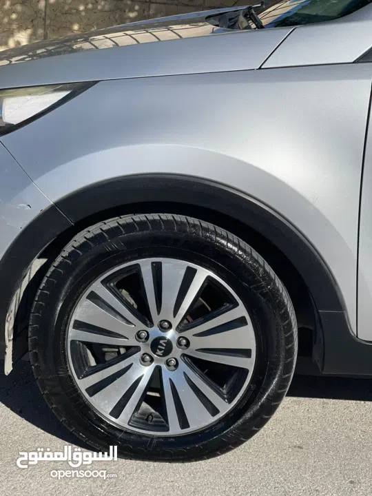 كيا سبورتاج فل الفل ما عدا فتحه ترخيص 2014  الجيب بوضع الشركة