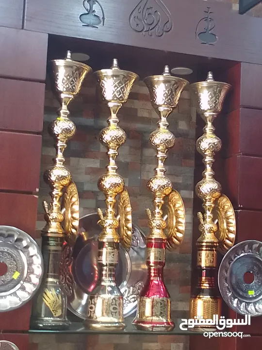 ديكور محل خشب خزائن رفوف زجاج + بضاعھ مشكل