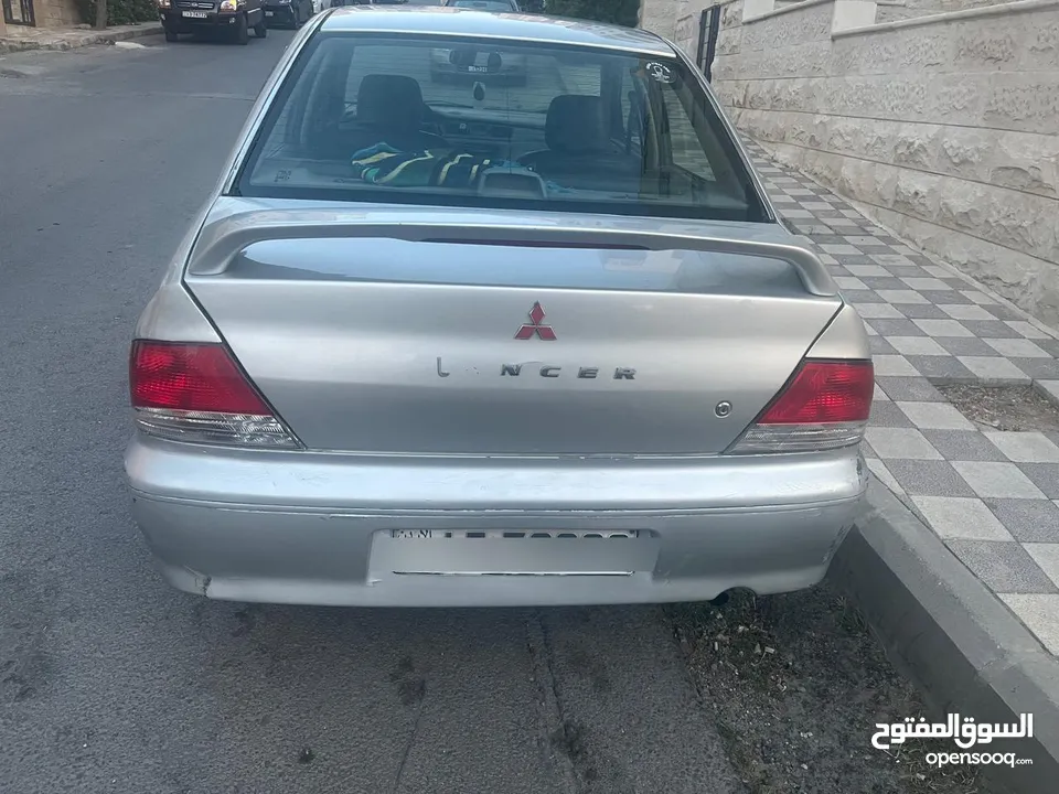 لانسر 2003 محول ماتور وقير 1600 موديل 2012 بحالة ممتازه مكيف شغال 100٪؜ غرفه نظيفه جلد اسود
