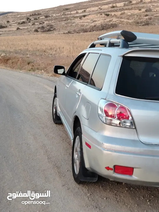 ميتسوبيشي اوت لاندر 2003
