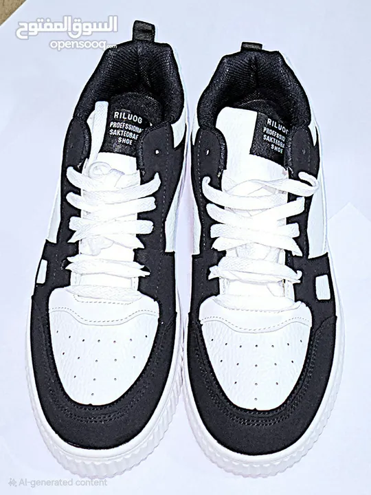 Black and white designer shoes size: 42 negotiable price FREE DELIVERY