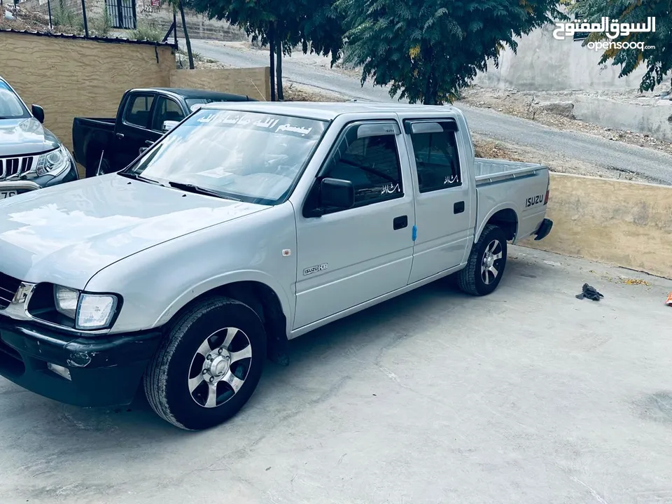 بيك اب ايسوزو 2003 KB / جمرك جديد /  اقساط دفعه أولى 2500
