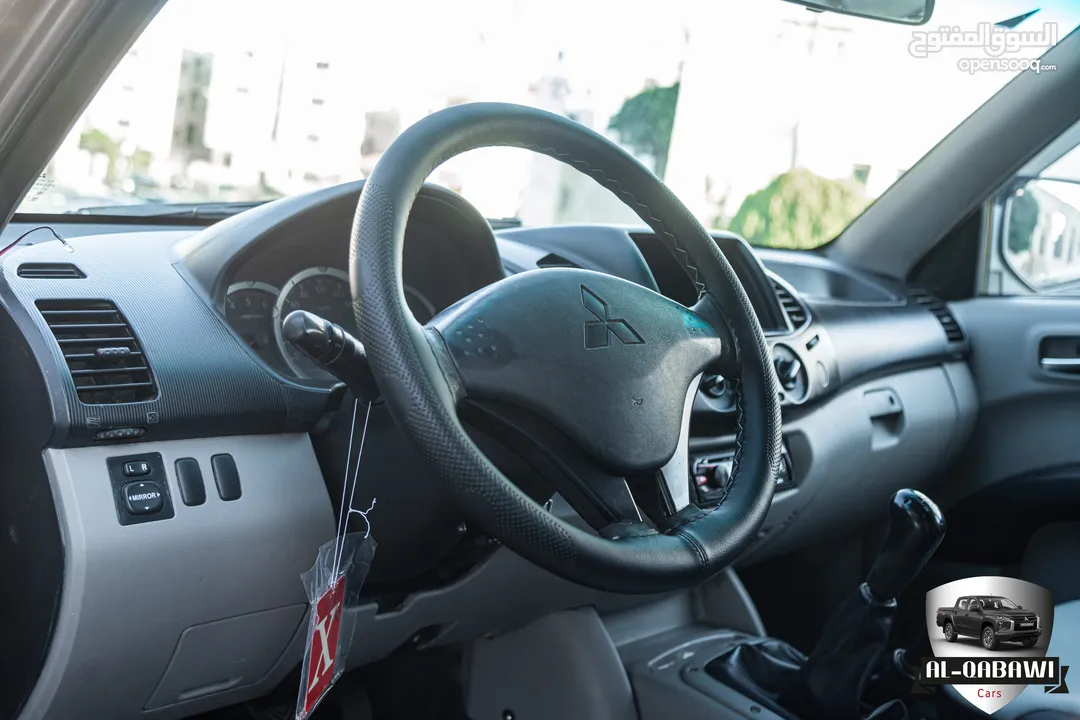 Mitsubishi L200 2013   البكب بحالة ممتازة