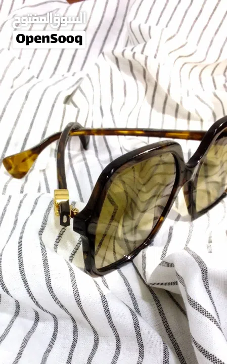 نظارات شمسية Gucci havana اصلية 100% شبه جديدة مع الرقم التسلسلي موجود فيها