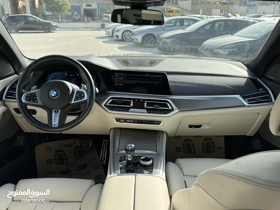 BMW X5 ترخيص 2022 ترخيص  محرك 3000 هايبرد plug in/يقطع على الشحنه 80 كيلو متر