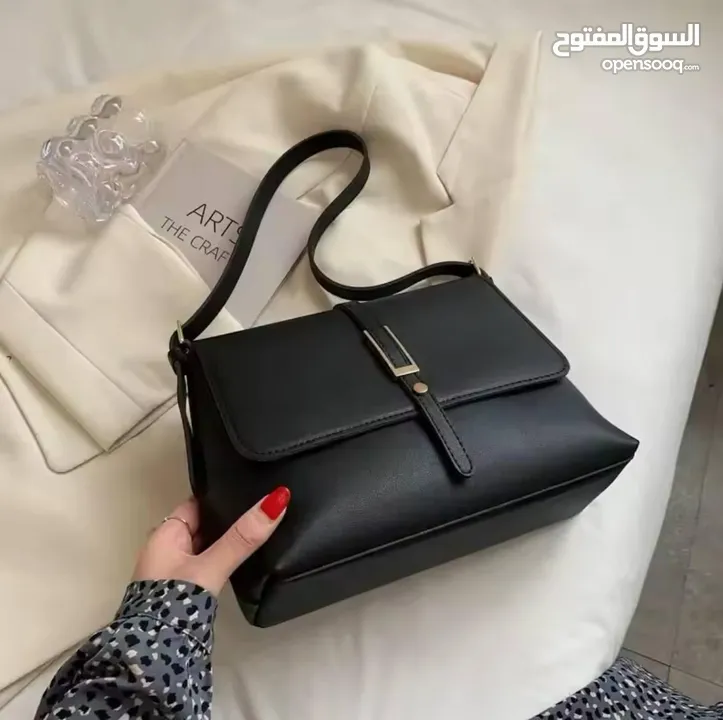شنتة ستاتي اصلي مع العلبة  جلد طبيعي جودة عالية جدا  سحاب ويد طويلة  مقاس 21×27