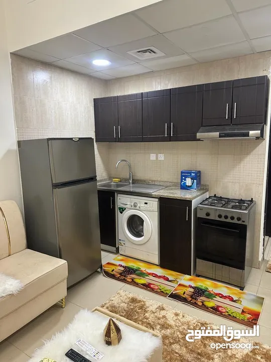 For rent in Ajman, studio in Al Yasmeen Towers, opposite Ajman City Centre, new furniture, easy exit
