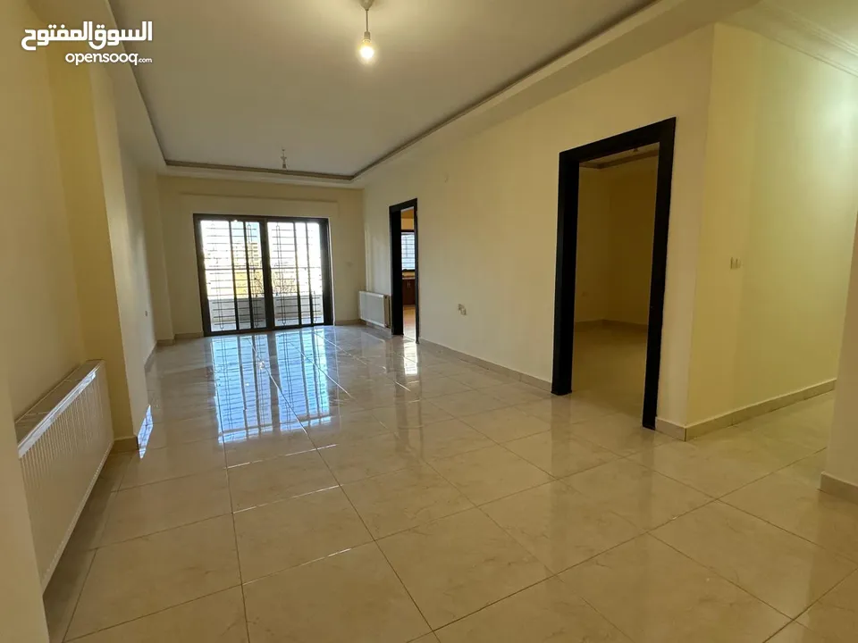 شقه غير مفروشه للأيجار في طريق المطار ( Property 40590 )-174899580
