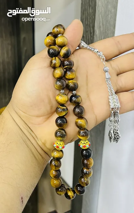 عرض خاص سبحه عين النمر ازرق او ذهبي بسعر حرق 33 حبة حلوة مش صغيرة للعلم مع طقم انتيومون مرتب