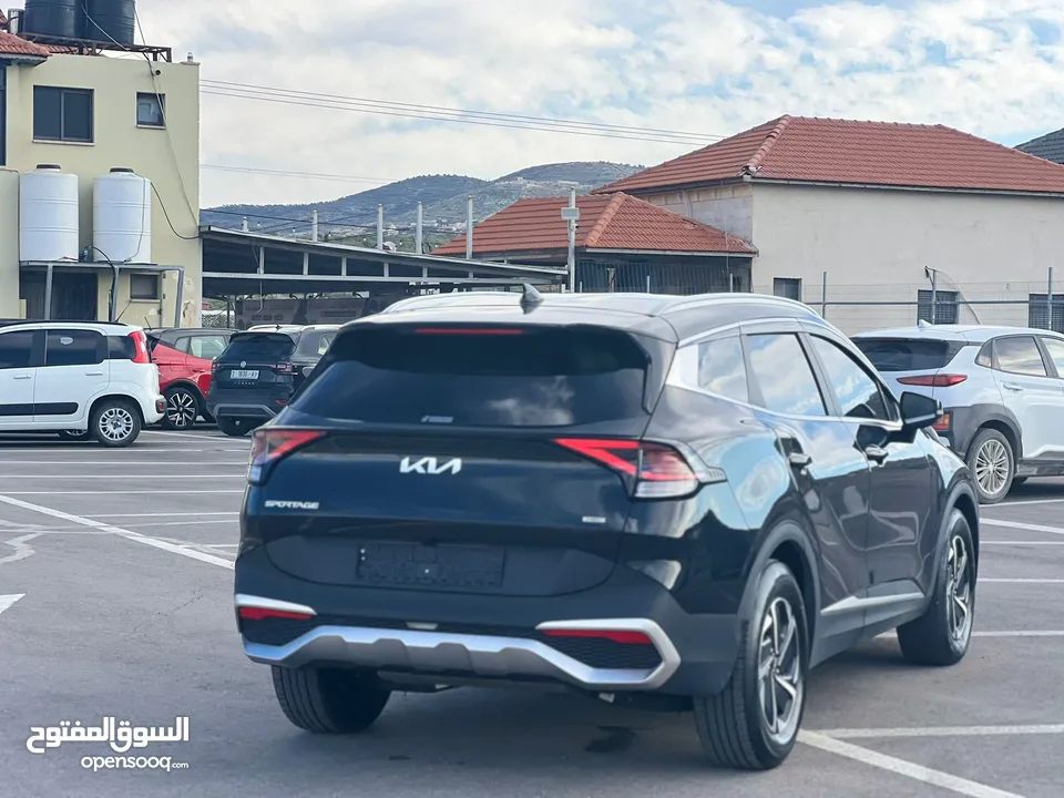 كايا سبورتاج /2022 فل بدون فتحة سقف 2x4 ///240Hp بنزين + كهرباء ( Haybrid) 1600cc