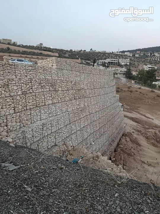 بناء سناسل حجريه استصلاح ارض زراعيه  تشييك المزارع تعبيد الشوارع تعبيد الساحات ملاعب شاليهات