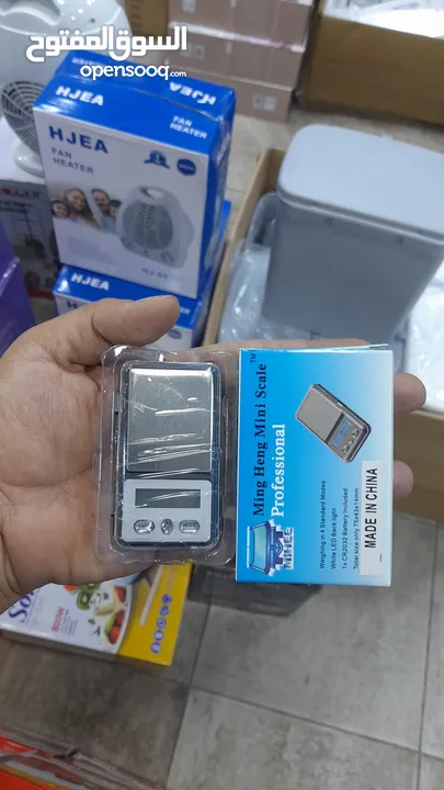 ميزان الكتروني صغير و دقيق  يحتاجه كل بائع ذهب مع محفظه صغيره