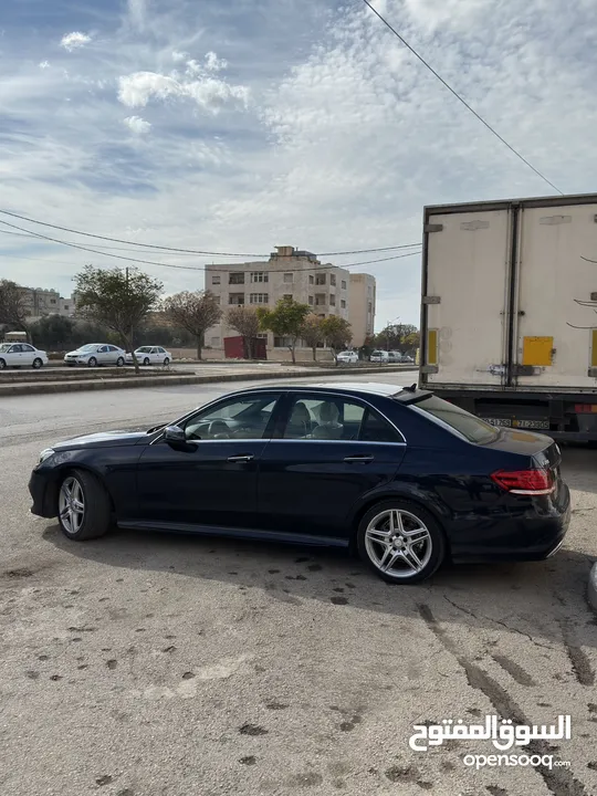 مرسيدس E200 AMG KIT ORGINAL  لون كحلي ماشية 105 الف  فل الفل  7 جيد