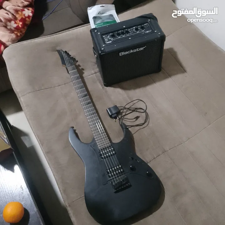 Ibanez electric guitar with amplifier