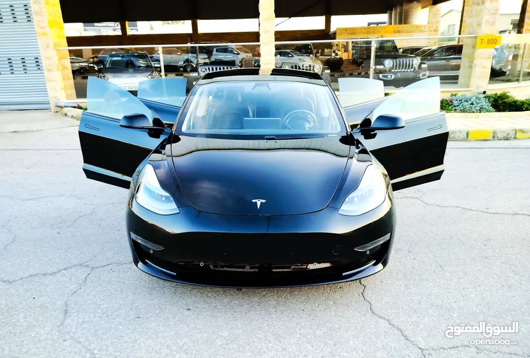 تيسلا 2021 model 3 فحص كامل 7 جــــيـــــد بحالة الوكالة لون مميز للبيع بسعر لقطة ومحرووووق