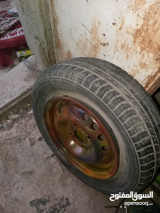 جنط مع كوشوك نضيف بس 10دينار