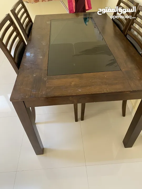 4 seaters dining table up for sale