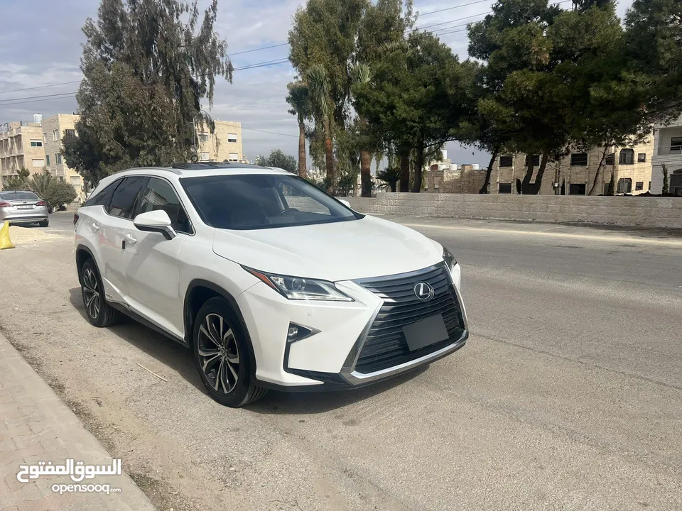 لكزس RX450hL موديل 2018 لون ابيض لؤلؤي وارد وصيانه الوكاله اعلى تصنيف من فئتها