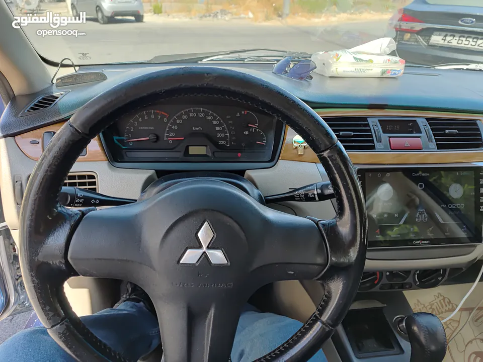 متسوبيشي لانسر GLX 2007 1600 cc وارد الخليج الكويت جميع الإضافات بإستثناء الفتحه وجنط إضافي.