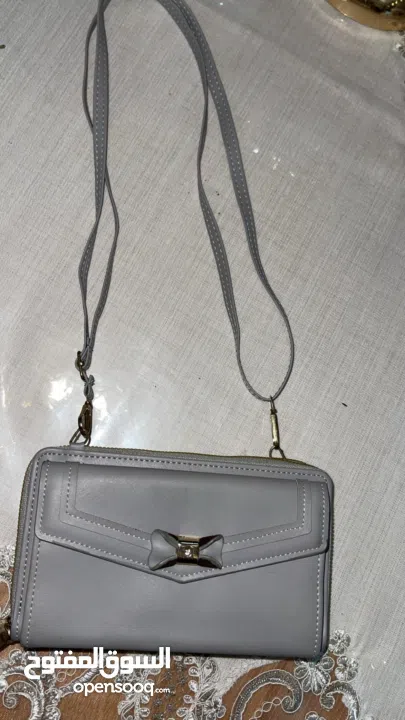 شنطة كتف رمادية