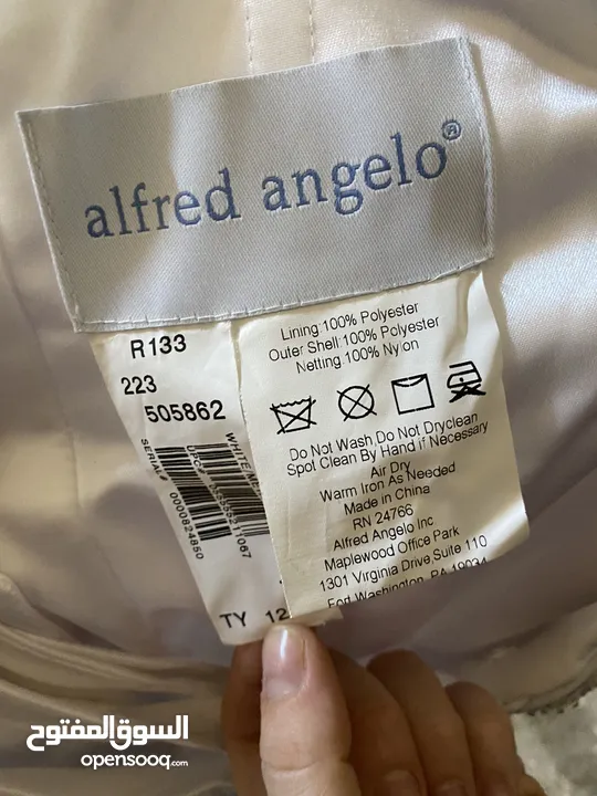 بدلة بيضاء أمريكية ماركة فريد أنجلو مستعملة استعمال واحد