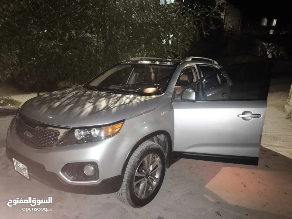 كيا سيرنتو4×4ديزل متور2200 فول اضافات فتحه بانوراما هوك مسجل بترخيص