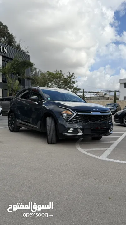 كيا سبورتاج ترخيص 2022 محرك 1600 هايبرد plug in/يقطع على الشحنه 65 كيلو متر  271 حصان