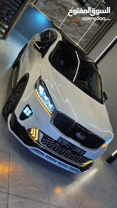 من اجمل كيا سورينتو فل ملغم دفع رباعي بحاله الشركه