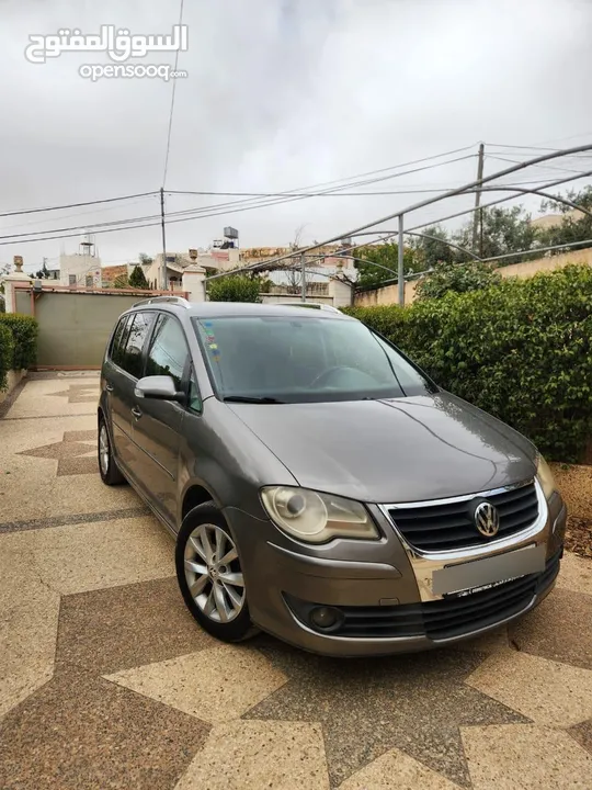 توران مدويل 2009 Volkswagen عائلية