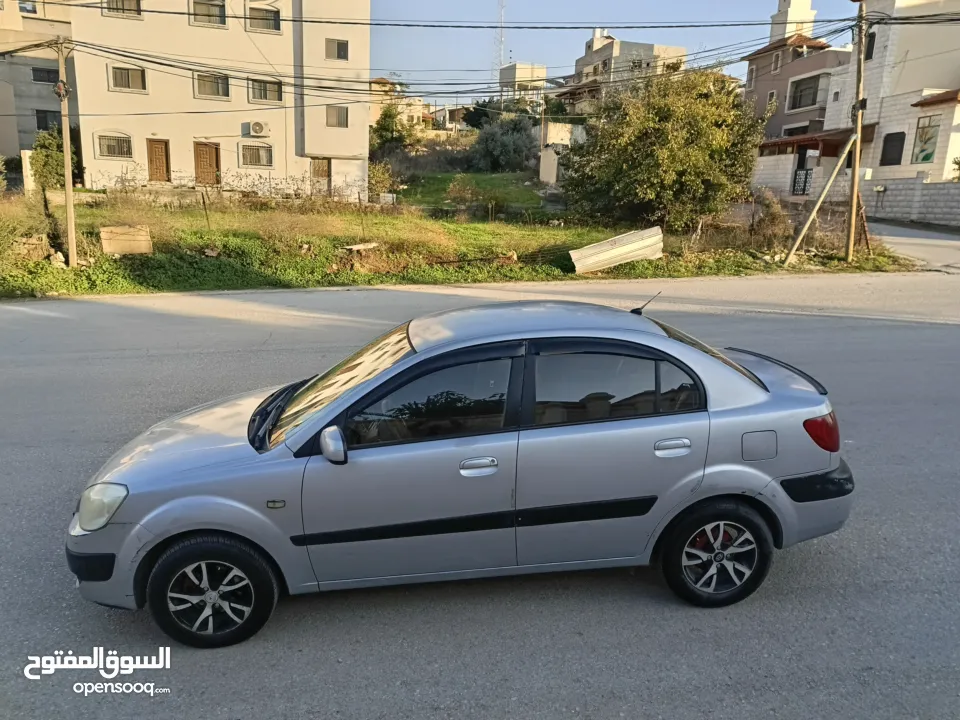 كيا برايد 2009 اتماتك دهان شركه ولا غرام بويا بسعر حرق 32000 ألف نقدا بدل وارد منبدل