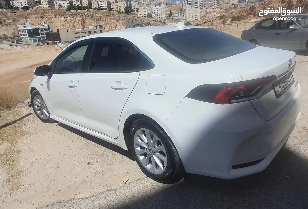 تويوتا كورولا 2021 هايبرد  للبيع مواصفات أوروبية سبعة جيد