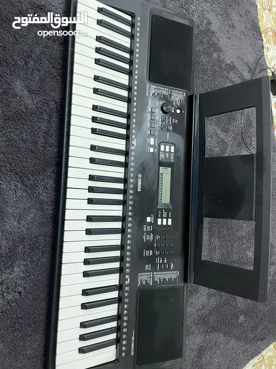 Yamaha PSR-E363 with power adaptor and holder