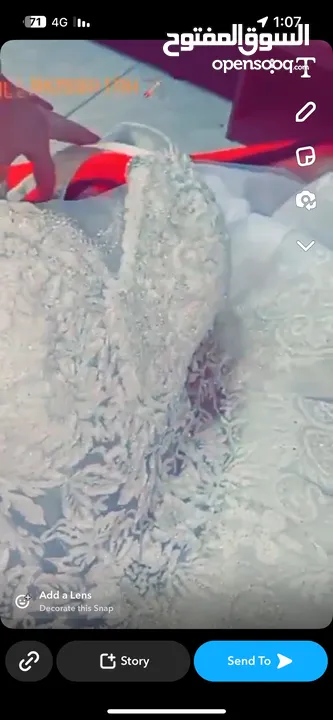 فستان زفاف ابيضّ
