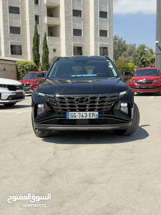 هونداي توسان ترخيص 2022 محرك 1600 هايبرد plug in/يقطع على الشحنه 52 كيلو متر