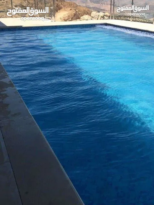 شاليه حديث للبيع جرش جبة المصطبة مطلة على السد مع مسبح