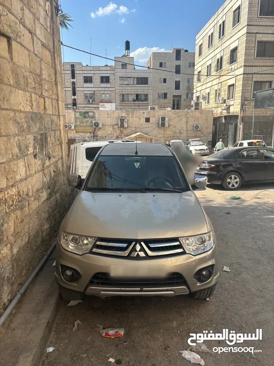 تندر متسبيشي L200 دفع خلفي 4x2 الحالة نظيف و السعر قابل لتفاوض مطور قير نظاف نظاف