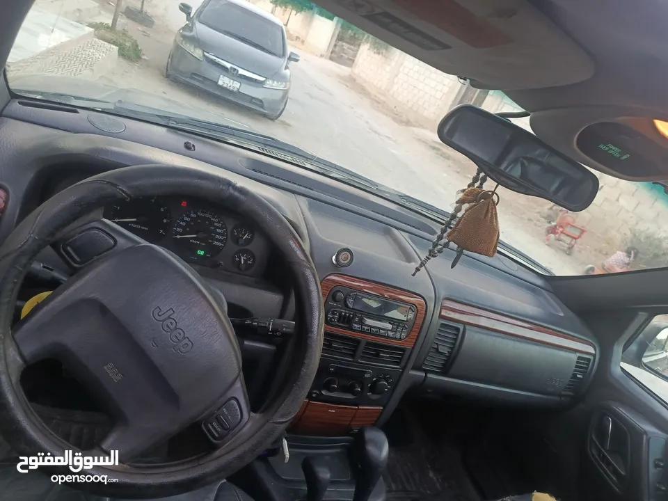 مواصفات جيب شروكي 1999