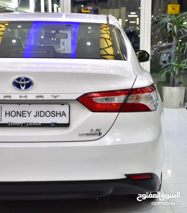 Toyota Camry LE Hybrid ( 2019 Model ) in White Color GCC Specs