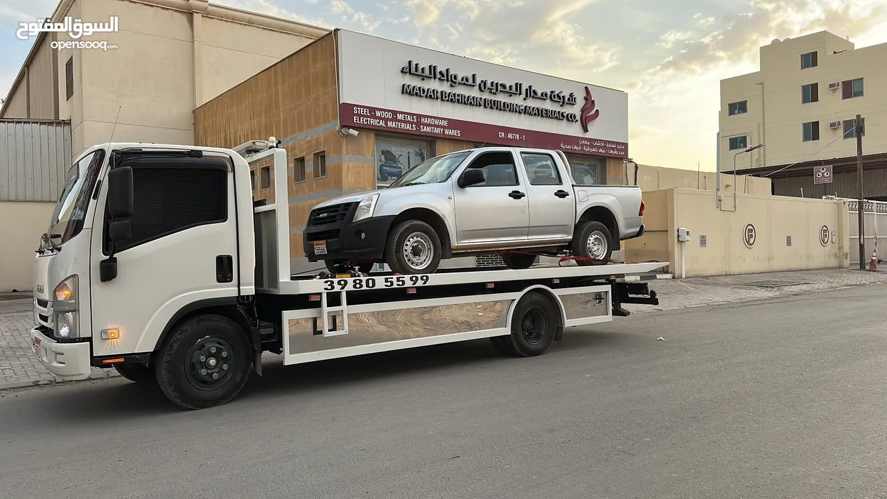 سطحة مدينة حمد 24 Hamad Town TOWING CAR 24 ونش رافعة رافعه نقل سطحة البحرين خدمات سحب سيارات